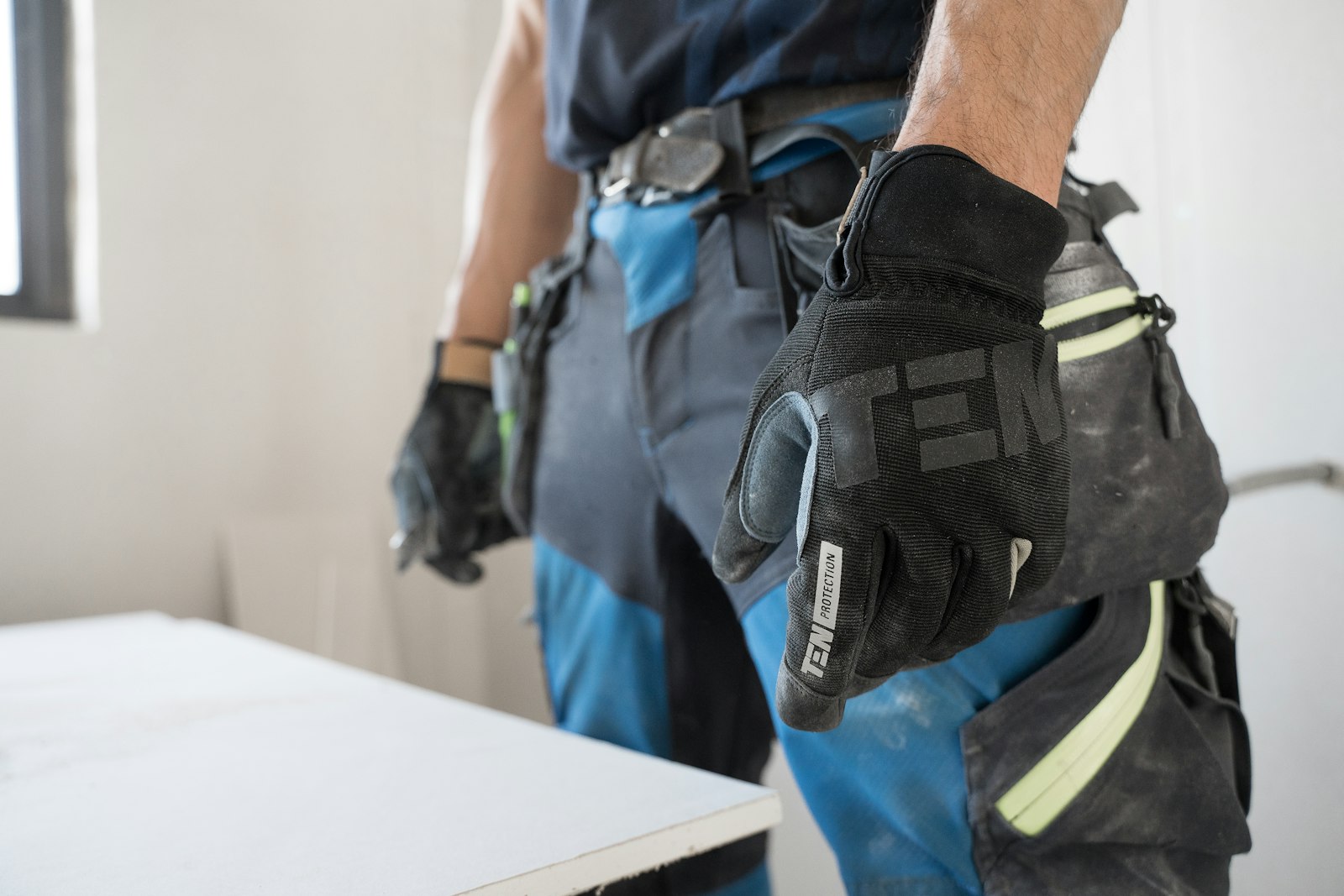 Work gloves and tool belt ready for the job